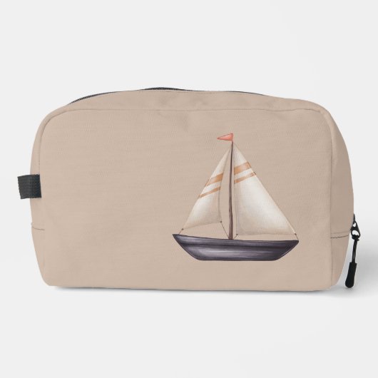 Braunes Segelboot und Name auf Beige Waschbeutel (Vorderseite)