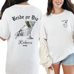 Braut oder Die Tode Party wir Bachelorette T-Shirt<br><div class="desc">Feiern Sie Ihren Junggeselinnen-Abschied im edgy Stil mit der Braut oder Die Til Death Do We Party Bachelorette T - Shirt. Dieses personalisierte Shirt mit Brautjungfrau ist mit einem kühnen Skelett ausgestattet, das einen Martini hält, der perfekt für diejenigen geeignet ist, die eine gotische Touch zu ihren Hochzeitsfeiern Liebe haben....</div>