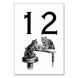 Brettspiele: Zwei Katzen spielen eine Schachpartie Tischnummer