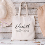 Bridesmaid Modernes Minimalistisches Drehbuch Bach Tragetasche<br><div class="desc">Erhöhen Sie Ihren Junggeselinnen-Abschied mit unserer Kollektion "Bridesmaid Modern Minimalistisch Script". Diese exquisite Produktlinie verkörpert zeitgenössische Eleganz und zeitlosen Stil, perfekt um Ihre kommenden Neuheiten auf moderne und raffinierte Weise zu feiern. Unser minimalistisches Skriptdesign stellt Ihre Brautmädchen an die Spitze und fügt jedem Element eine Touch von Klasse hinzu. Ob...</div>