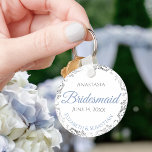 Bridesmaid Wedding Gift Light Blue & Gray Lacy Schlüsselanhänger<br><div class="desc">These keychains are designed to give as favors to bridesmaids in your wedding party. Designed to coordinate with our Blue & Gray Elegant Wedding Suite, they feature a simple yet elegant design with a white background, light blue & Gray text, and a silver faux foil floral border. Perfect way to...</div>