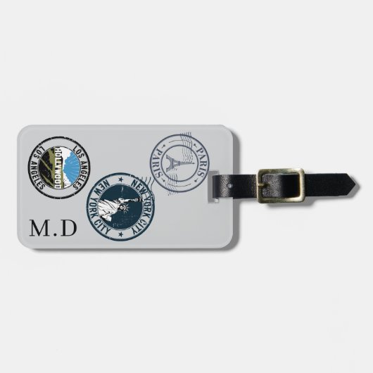 Briefmarke mit grauem Pass, Monogramm Gepäckanhänger (Vorderseite horizontal)