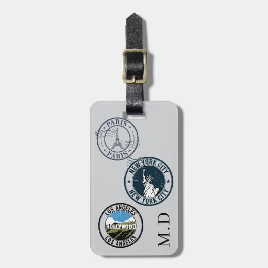 Briefmarke mit grauem Pass, Monogramm Gepäckanhänger (Vorderseite vertikal)