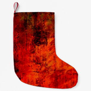 Bright red dirty old black peeled background. Hall Kleiner Weihnachtsstrumpf
