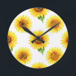 Bright Sunflower Watercolor Seamless Pattern Runde Wanduhr<br><div class="desc">Radiant joy in full bloom! This cheerful,  hand-painted watercolor pattern bursts with large,  golden sunflowers against crisp white,  each bloom detailed with warm amber centers,  soft petals,  and fresh green leaves. A timeless,  uplifting floral design that brings instant summer happiness and sunshine vibes.</div>