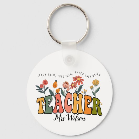 Bringen Sie ihnen Liebe bei. Personalisierter Lehr Schlüsselanhänger (Vorderseite)