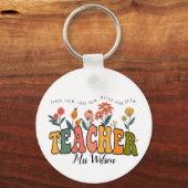 Bringen Sie ihnen Liebe bei. Personalisierter Lehr Schlüsselanhänger (Rückseite)