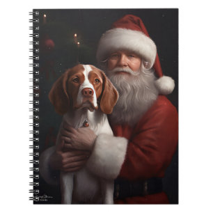 Brittany Spaniel mit Weihnachten im Weihnachtsmann Notizblock