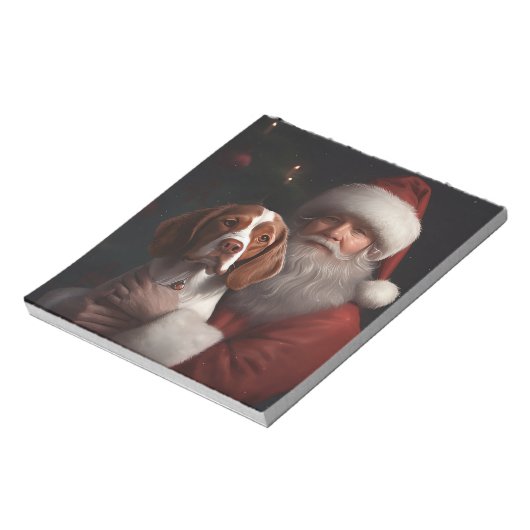 Brittany Spaniel mit Weihnachten im Weihnachtsmann Notizblock (Rotiert)