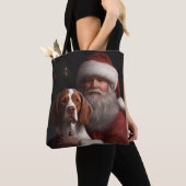 Brittany Spaniel mit Weihnachten im Weihnachtsmann Tasche (Von Nahem)