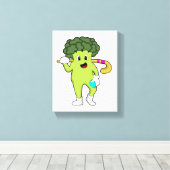 Broccoli im Hockey mit Hockey-Fledermaus Leinwanddruck (Insitu (Holzboden))