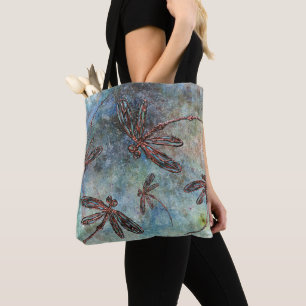 Bronze-verzauberte Libellen auf einem magischen Hi Tasche