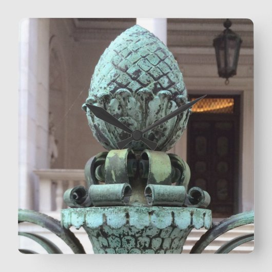 Bronzeananas-Uhr behält Gastfreundschafts-Zeit Quadratische Wanduhr (Vorderseite)