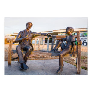 Bronzestatue von jung und alt im Gespräch Fotodruck