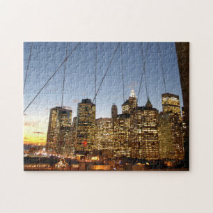 Brooklyn Bridge bei Dämmerung mit Manhattan-Skylin Puzzle