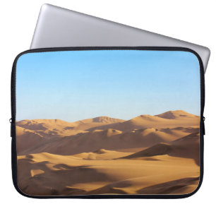 BROWN AND WHITE MOUNTAINS UNDER BLUE SKY DURING DA LAPTOPSCHUTZHÜLLE