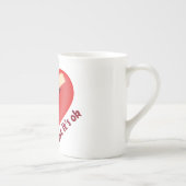 Brüchendes Herz geheilt mit Pflaster und Zitat zum Porzellantasse (Rechts)