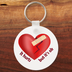 Brüchendes Herz geheilt mit Pflaster und Zitat zum Schlüsselanhänger