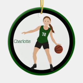 Brünetter Mädchen-Basketball-Spieler im Grün und Keramik Ornament