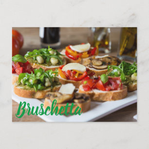 Bruschetta Antipasti mit Bohnen und Arugula, Feiertagspostkarte