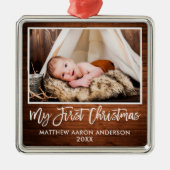 Brush Script Rustic Wood Baby First Christmas Ornament Aus Metall (Vorne)