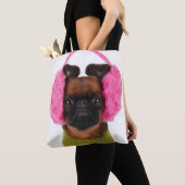 Brüssel Griffon mit rosa Ohrenschützern Tasche (Von Nahem)