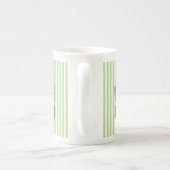 Buch-Mädchen im Stuhl, aquamarine grüner Porzellantasse (Rückseite)