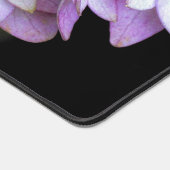 Buch über viele versteinerte violette Blumen Schreibtischunterlage (Ecke)