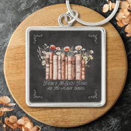Bücher mit Blume und Zitat aus schwarzem Halbbrett Schlüsselanhänger