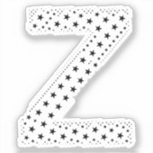 BUCHSTABEN AUS SCHWARZEN STERNEN AUFKLEBER (Vorderseite)
