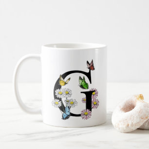 Buchstaben G Botanisches Farbenschmetterlingsmonog Kaffeetasse
