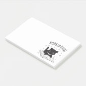 Buchtrovertekatze mit Buch und Sternen Post-it Klebezettel (angewinkelt)