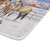 Buckskin Quarter Pferde im Schnee Schneidebrett (Ecke)