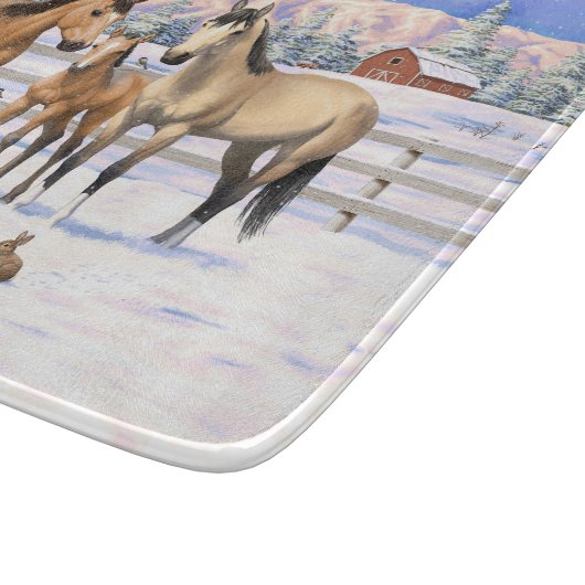 Buckskin Quarter Pferde im Schnee Schneidebrett (Ecke)