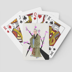 Buddhistischer Mönch, der Karten spielt Spielkarten