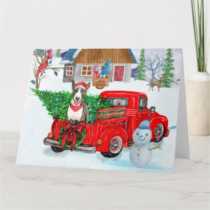 Bull Terrier Hund im Weihnachtslieferwagen Schnee Karte