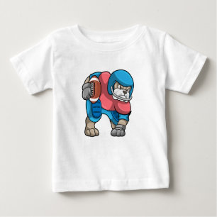 Bulldog beim Sport mit Fußball und Helm Baby T-shirt
