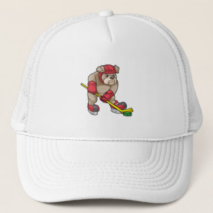 Bulldog mit Eishockey und Eishockeyschläger Truckerkappe