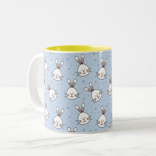 Bunnies aus weißem Osterland auf hellblau Zweifarbige Tasse (Vorderseite Links)