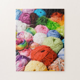 Bunte Bälle des Garns Puzzle