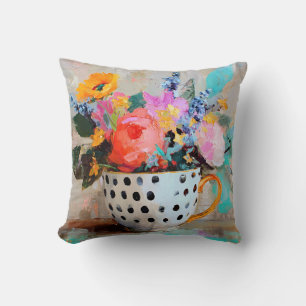 Bunte Blumen in einer Tasse mit Punkten Kissen