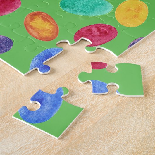 Bunte Farbostereier auf grünen Puzzlespielen Puzzle (Seite)