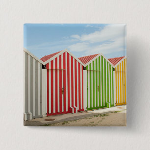 Bunte Hütten auf Strand Button
