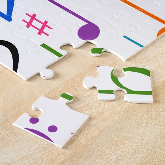 Bunte musikalische Anmerkungen und Symbole Puzzle (Seite)