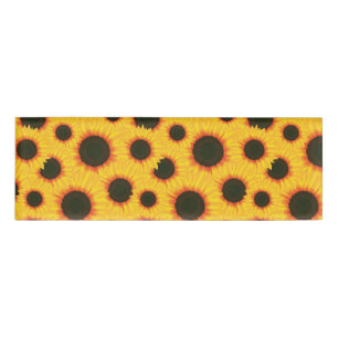 Bunte Mustersonnenblume des Frühlinges Namenschild