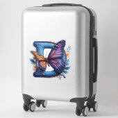 Bunte Schmetterling auf hellblauem Buchstaben D Aufkleber (Koffer)