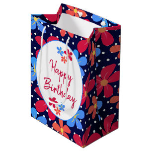 Bunte Tageszeitungen zu Polka-Punkten Mittlere Geschenktüte