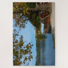 Bunte touristische Boote im See bluteten im Fall Puzzle