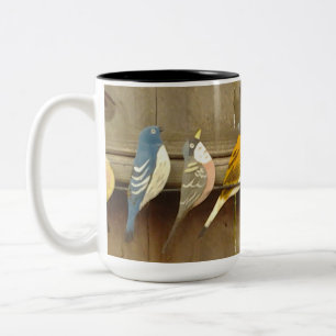 Bunte Vögel auf einem Zaun Zweifarbige Tasse