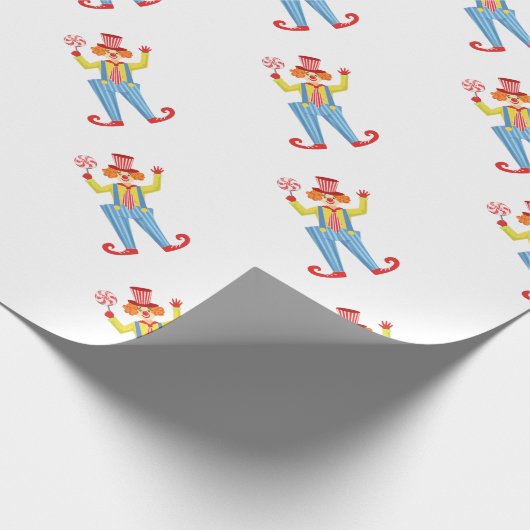 Bunter freundlicher Clown mit Lollypop in Geschenkpapier (Ecke)